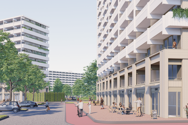 Groot wooncomplex met meerdere verdiepingen, omgeven door groen en een waterpartij, met een fietser op het pad op de voorgrond.